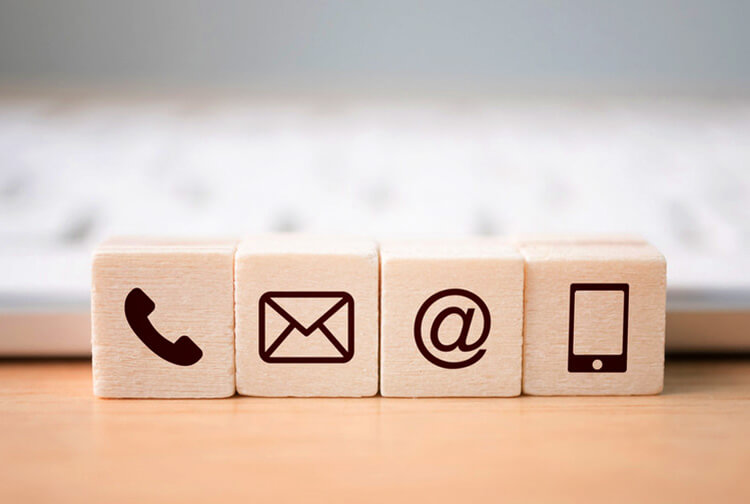 Phone, mail, email and tablet painted icons on small wood tiles