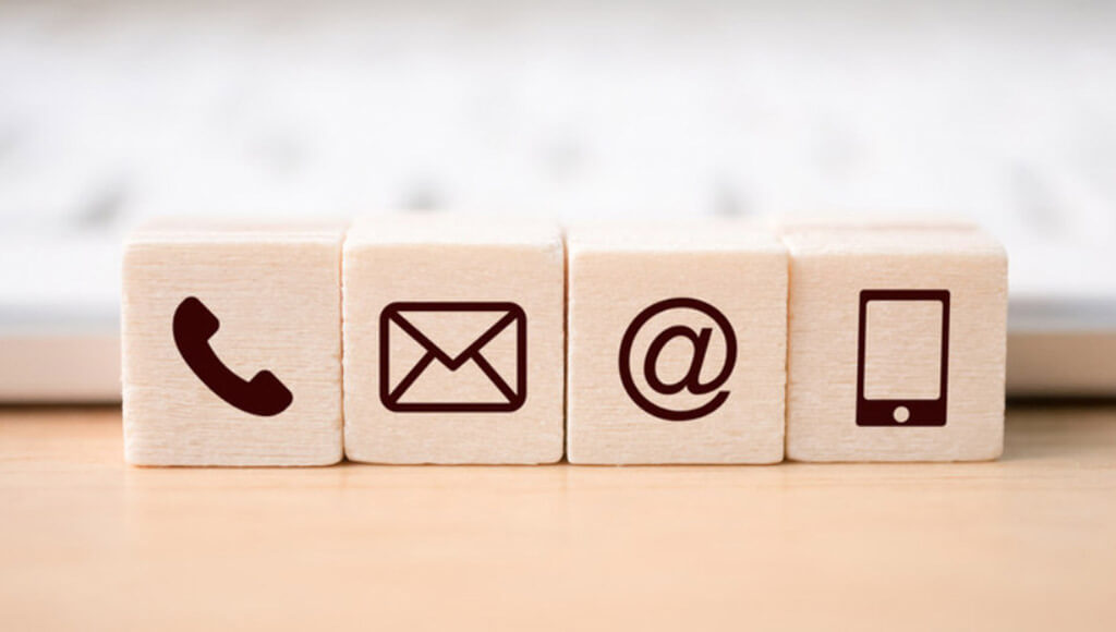 Phone, mail, email and tablet painted icons on small wood tiles