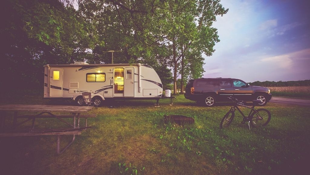 SUV with Camper in Summer
