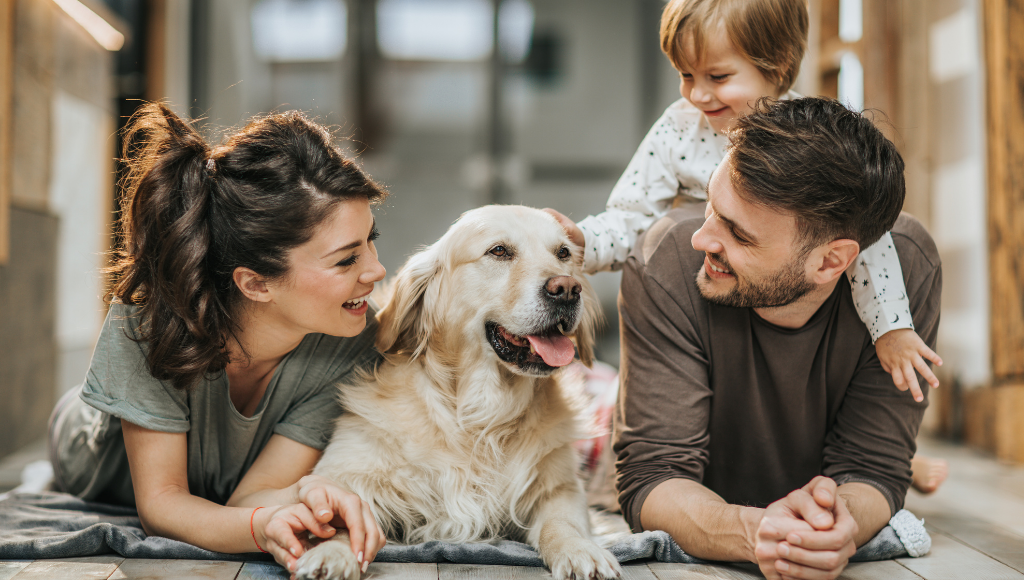 family in new home with dog