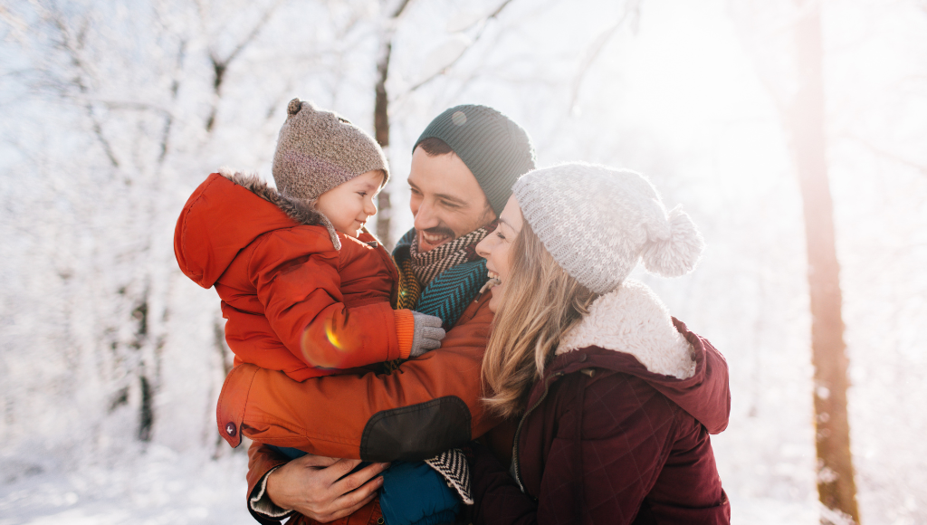 family in snow